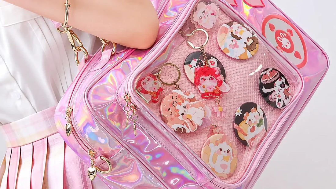 itabag-shop holographic pink ita bag featuring cute enamel pins, anime keychains, and collectible badges.