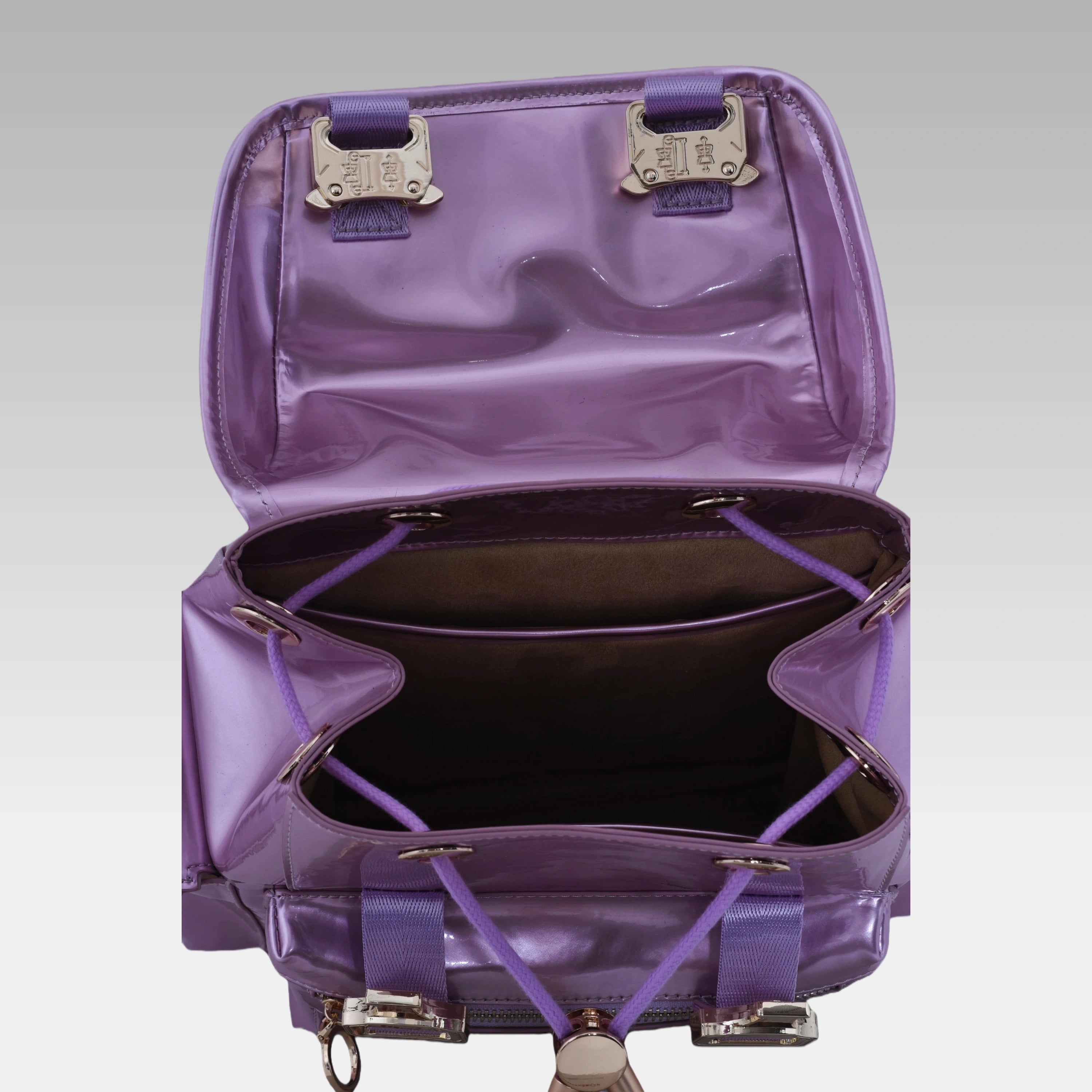 Interior view of the Frozen Berry Metallic Cyberpunk Ita Backpack Mini showing the custom fabric lining and storage compartments.