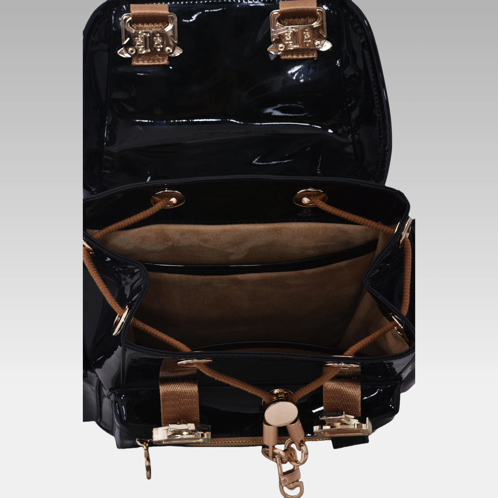 Interior view of the Glossy Black Cyberpunk Ita Backpack Mini showing the custom fabric lining and storage compartments.
