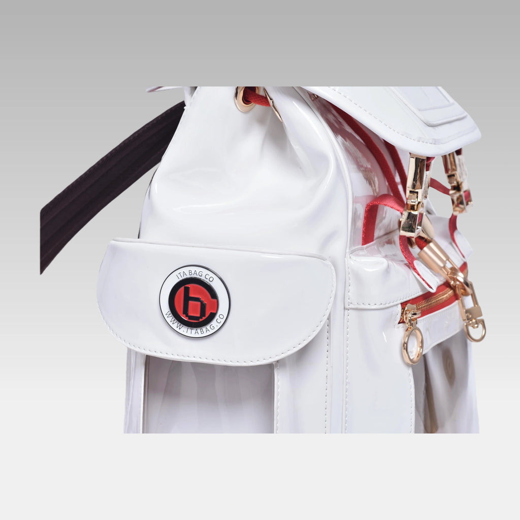 Close-up macro detail of the custom hardware emblem on the Glossy White Cyberpunk Ita Bag.