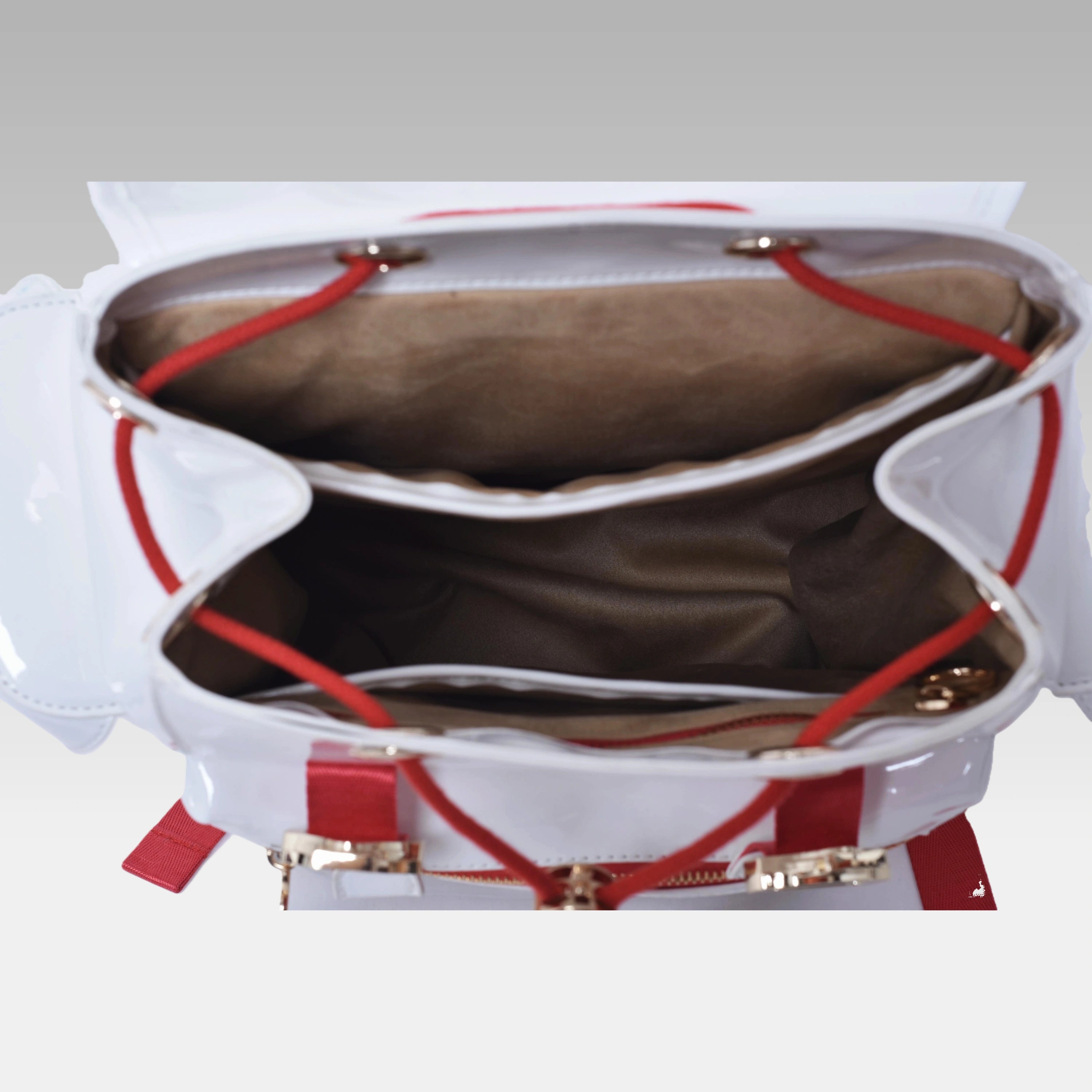Interior view of the Glossy White Cyberpunk Ita Backpack showing the custom fabric lining and storage compartments.