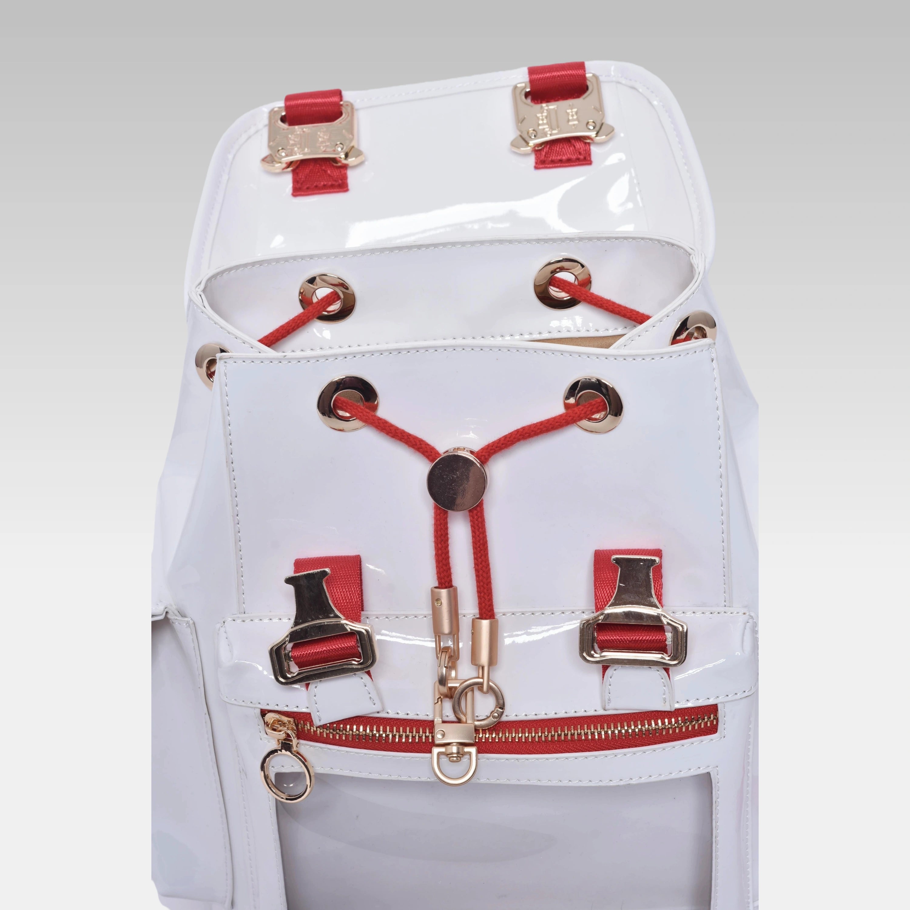 Detailed close-up view of the open structured display window and internal red attachment chamber of the Glossy White Mini Cyberpunk Ita Backpack.
