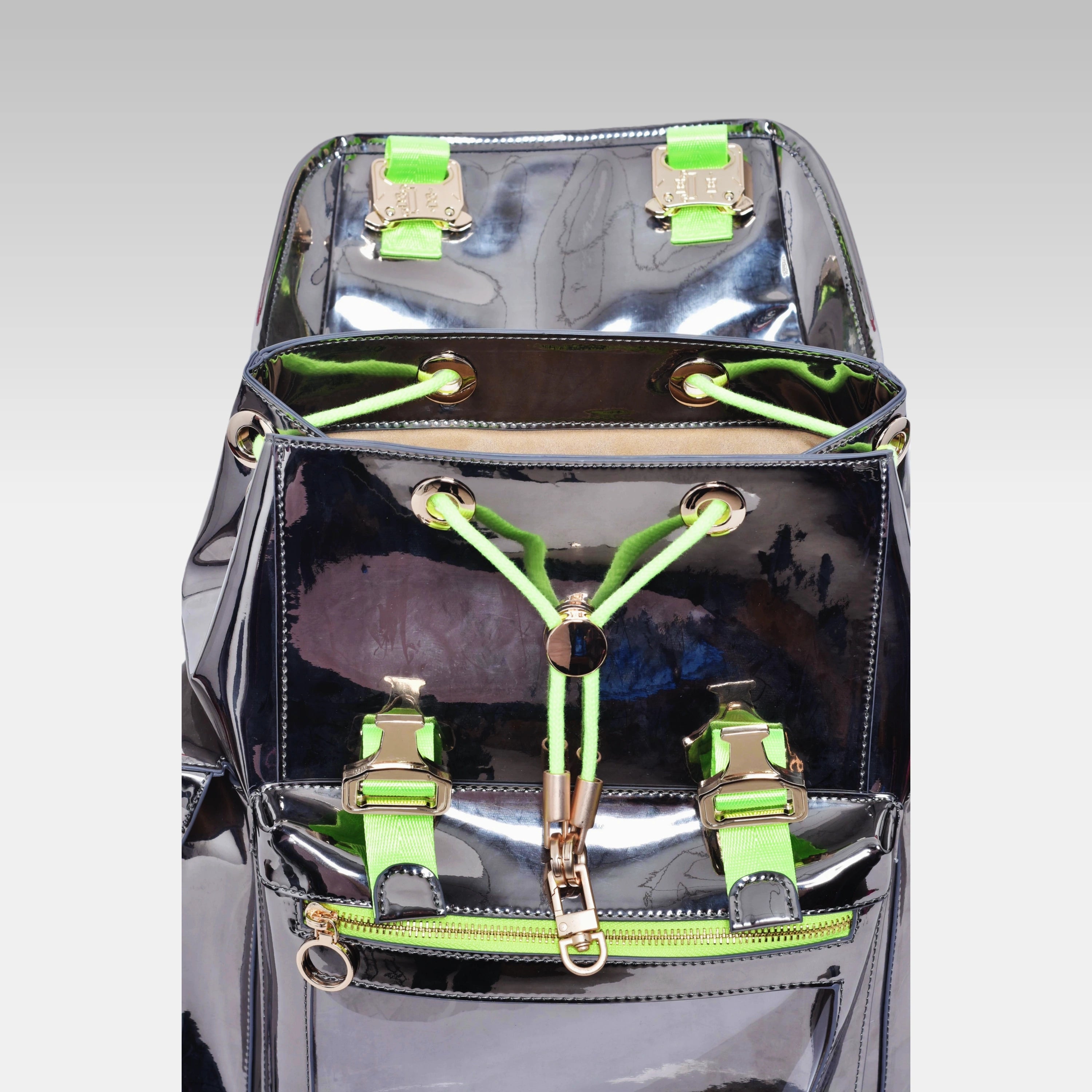 Standard Metallic Gray Cyberpunk Ita Backpack with the front display cover opened, revealing the internal display chamber.