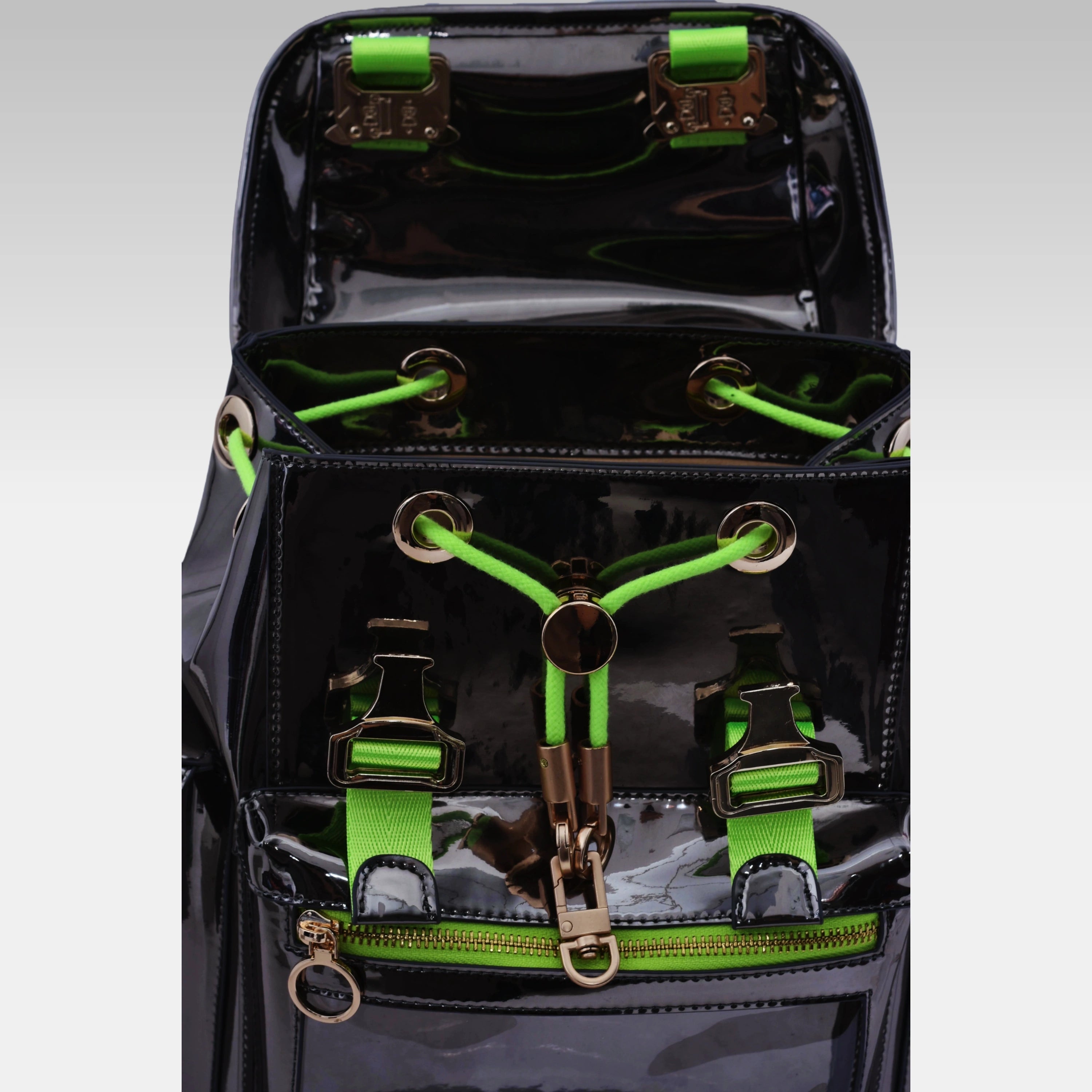 Metallic Gray Cyberpunk Ita Backpack Mini with the front display cover opened, revealing the internal display chamber.