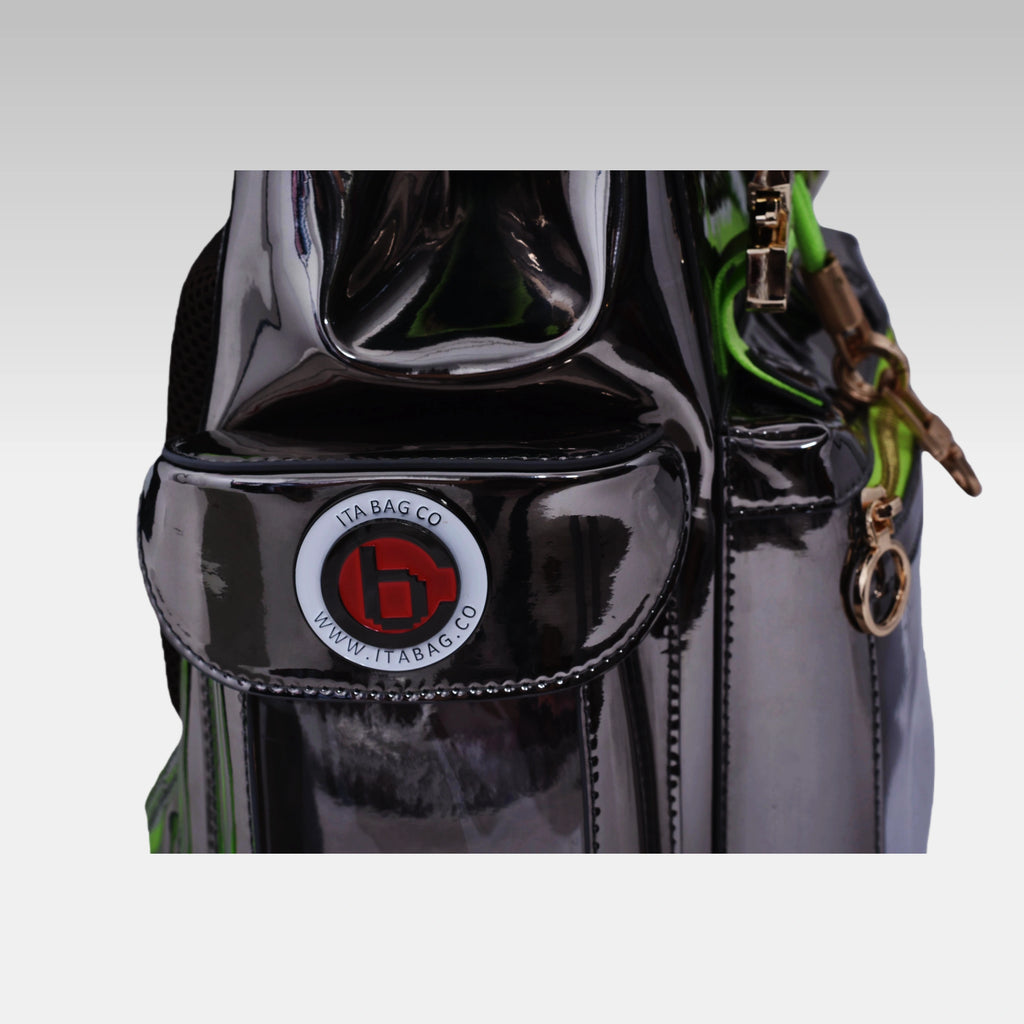 Close-up macro detail of the custom hardware emblem on the Metallic Gray Cyberpunk Ita Bag Mini.