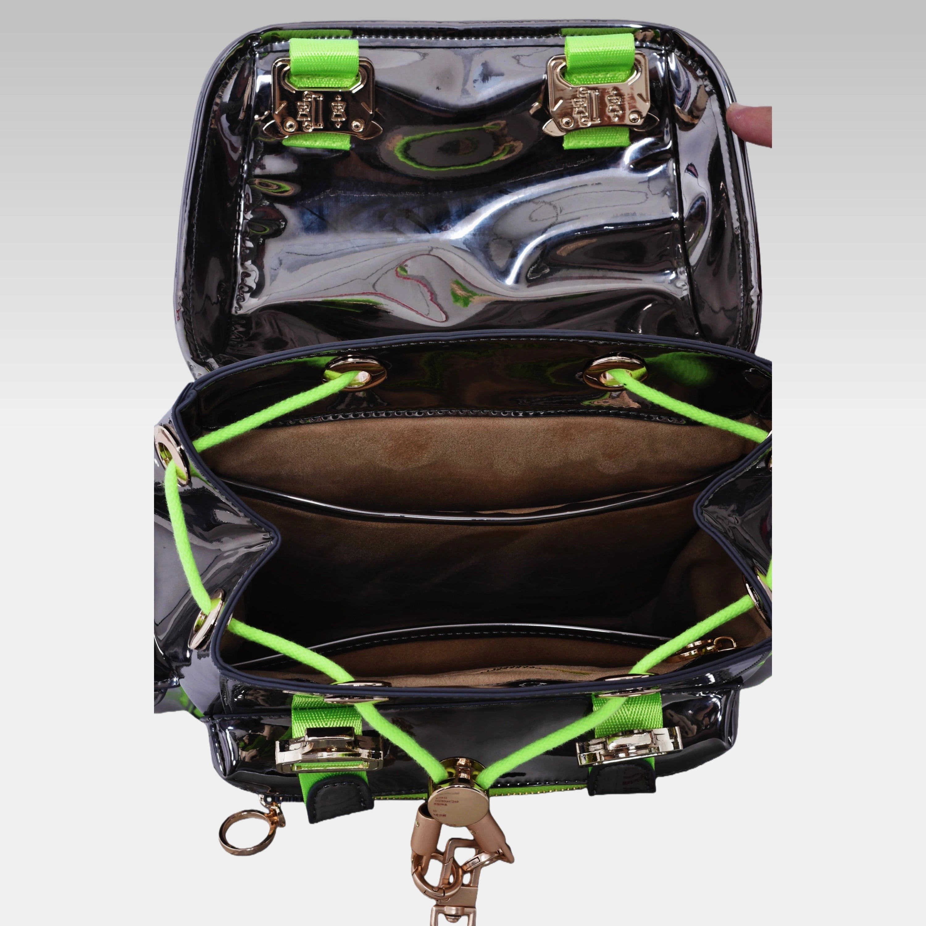 Interior view of the Metallic Gray Cyberpunk Ita Backpack Mini showing the custom fabric lining and storage compartments.
