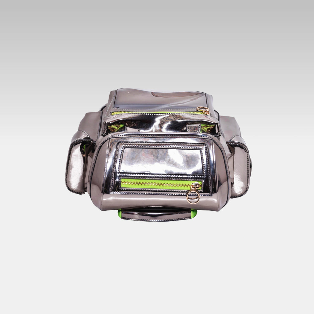 Top-down view of the Metallic Gray Cyberpunk Ita Backpack Mini highlighting the top zipper closures and grab handle.
