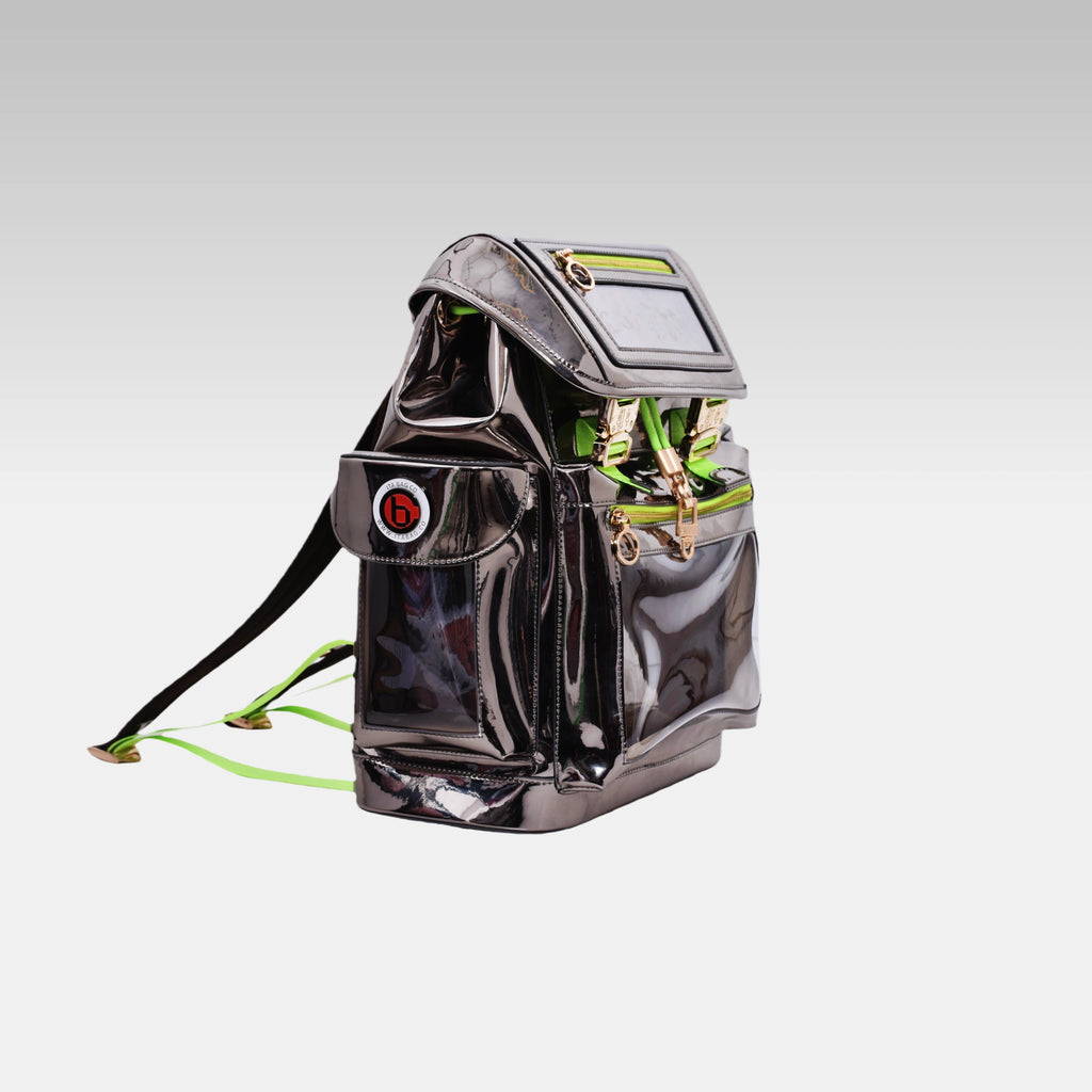 Side profile of the standard Metallic Gray Cyberpunk Ita Backpack featuring the prominent custom hardware emblem.