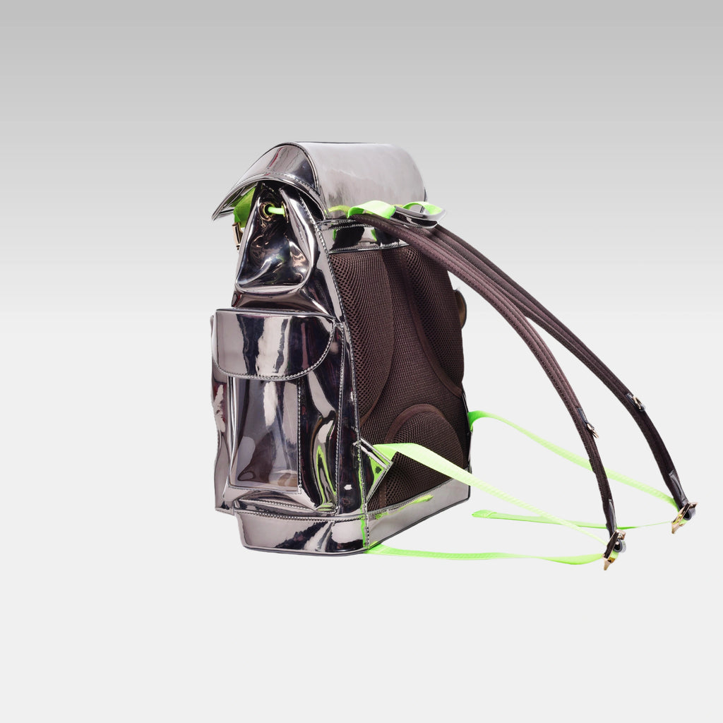 Clean side profile of the standard Metallic Gray Cyberpunk Ita Backpack showing its structured depth, without the custom emblem.