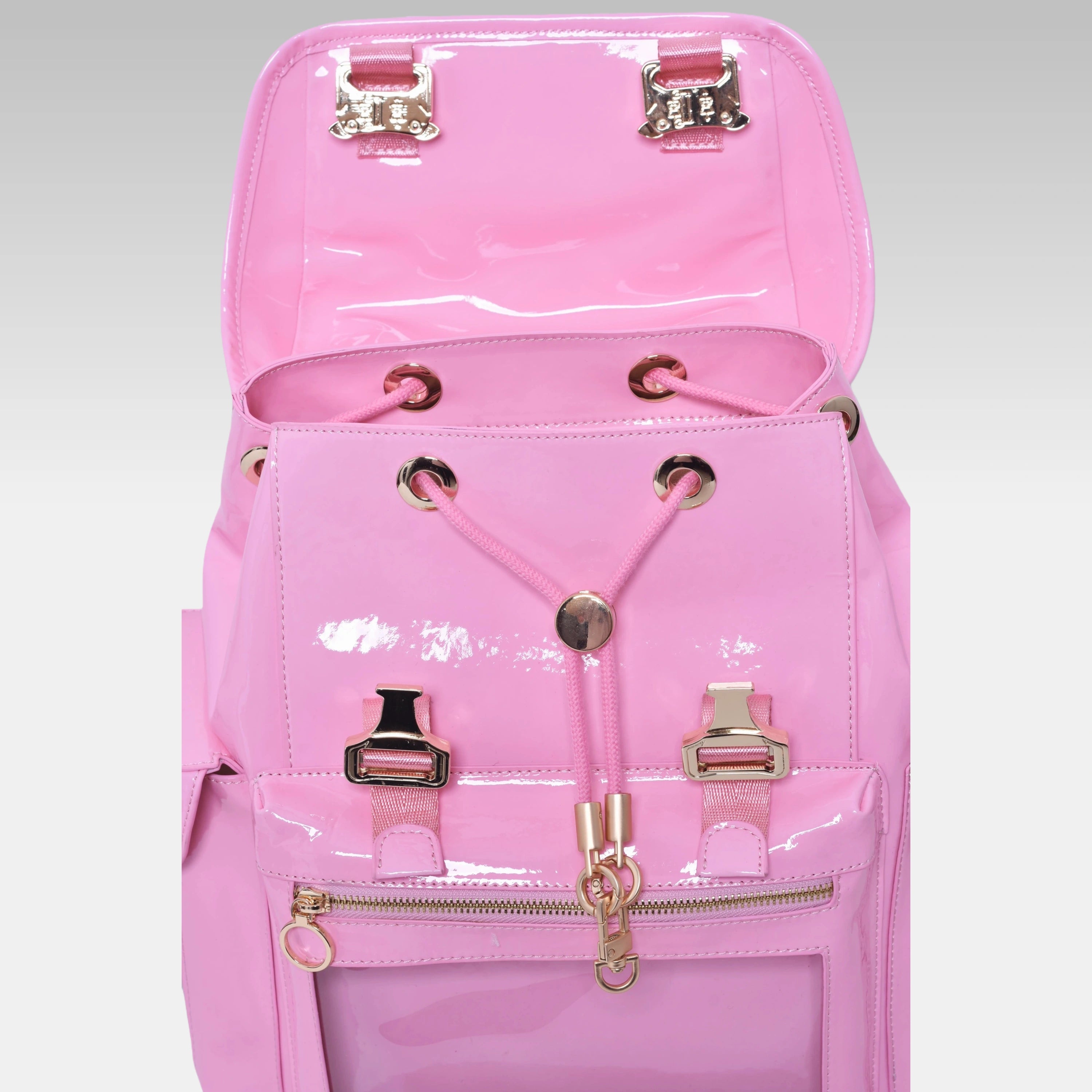 Pastel Pink Cyberpunk Ita Backpack with the front display cover opened, revealing the internal display chamber.