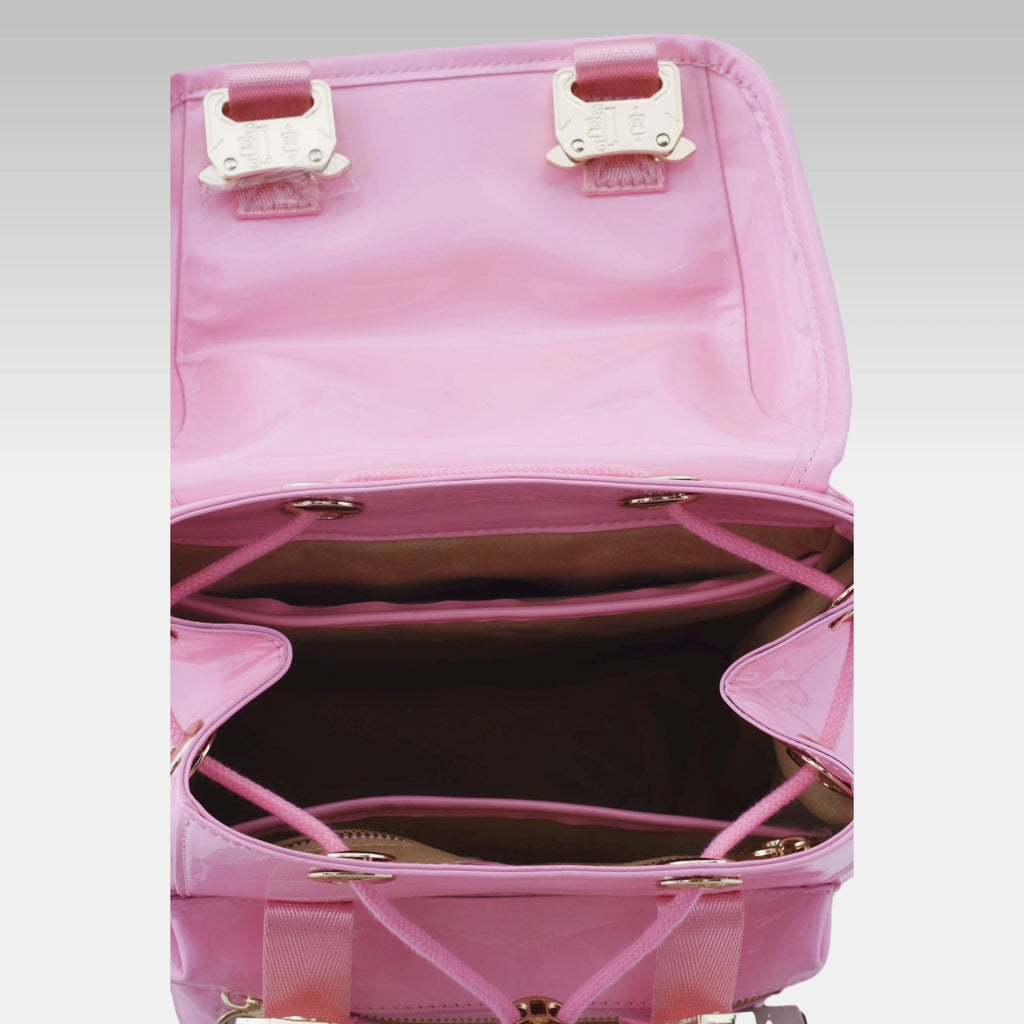 Pastel Pink Cyberpunk Ita Backpack Mini with the front display cover opened, revealing the internal display chamber.