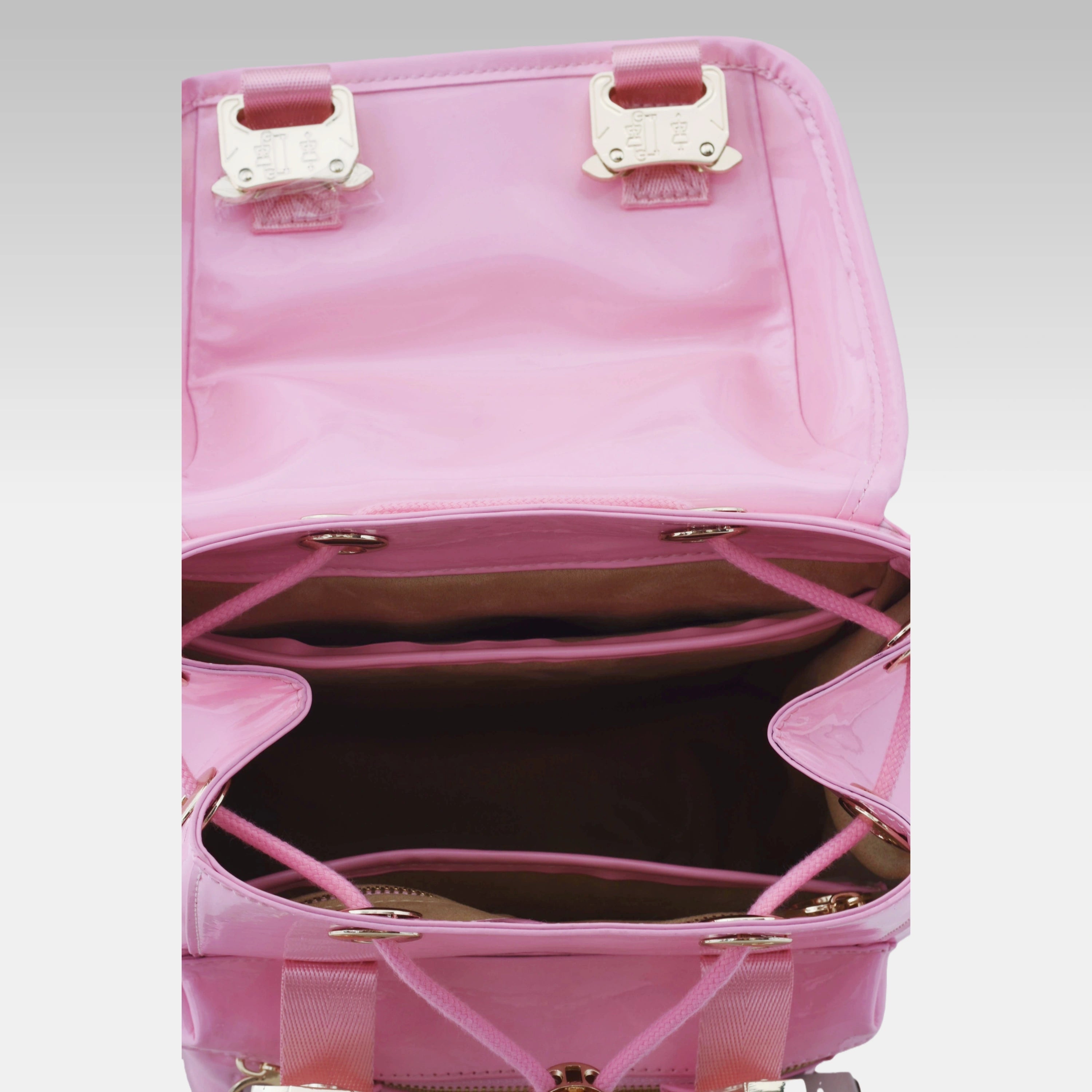 Pastel Pink Cyberpunk Ita Backpack Mini with the front display cover opened, revealing the internal display chamber.