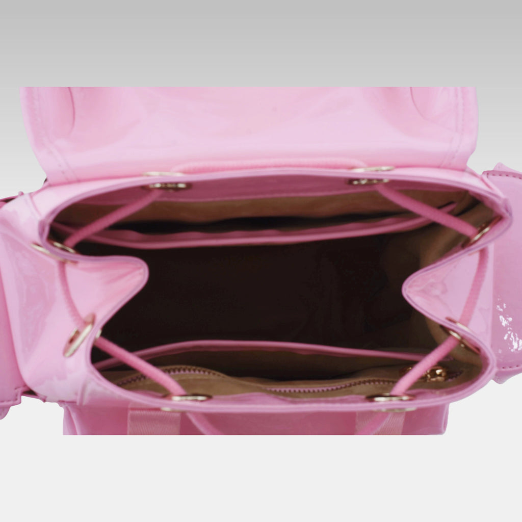 Interior view of the Pastel Pink Cyberpunk Ita Backpack Mini showing the custom fabric lining and storage compartments.