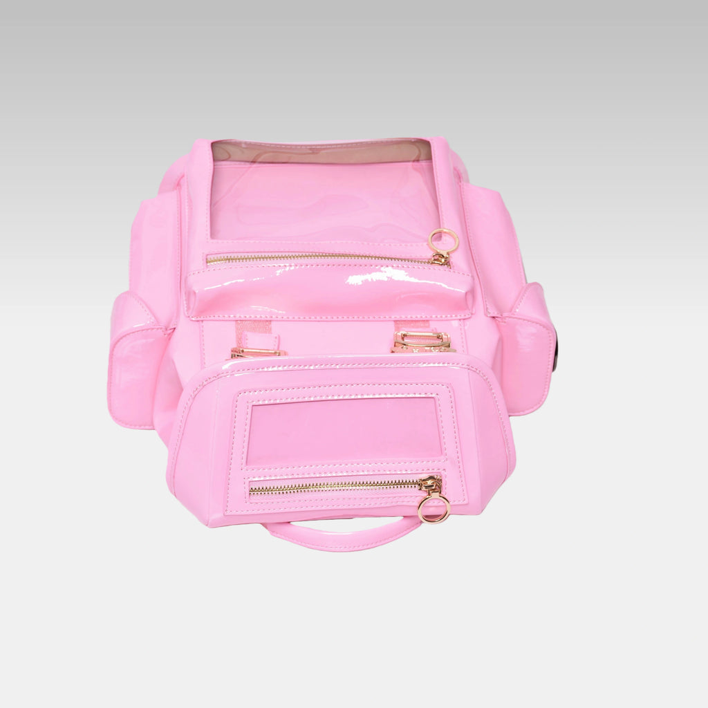 Top-down view of the Pastel Pink Cyberpunk Ita Backpack Mini highlighting the grab handle and top zipper closures.