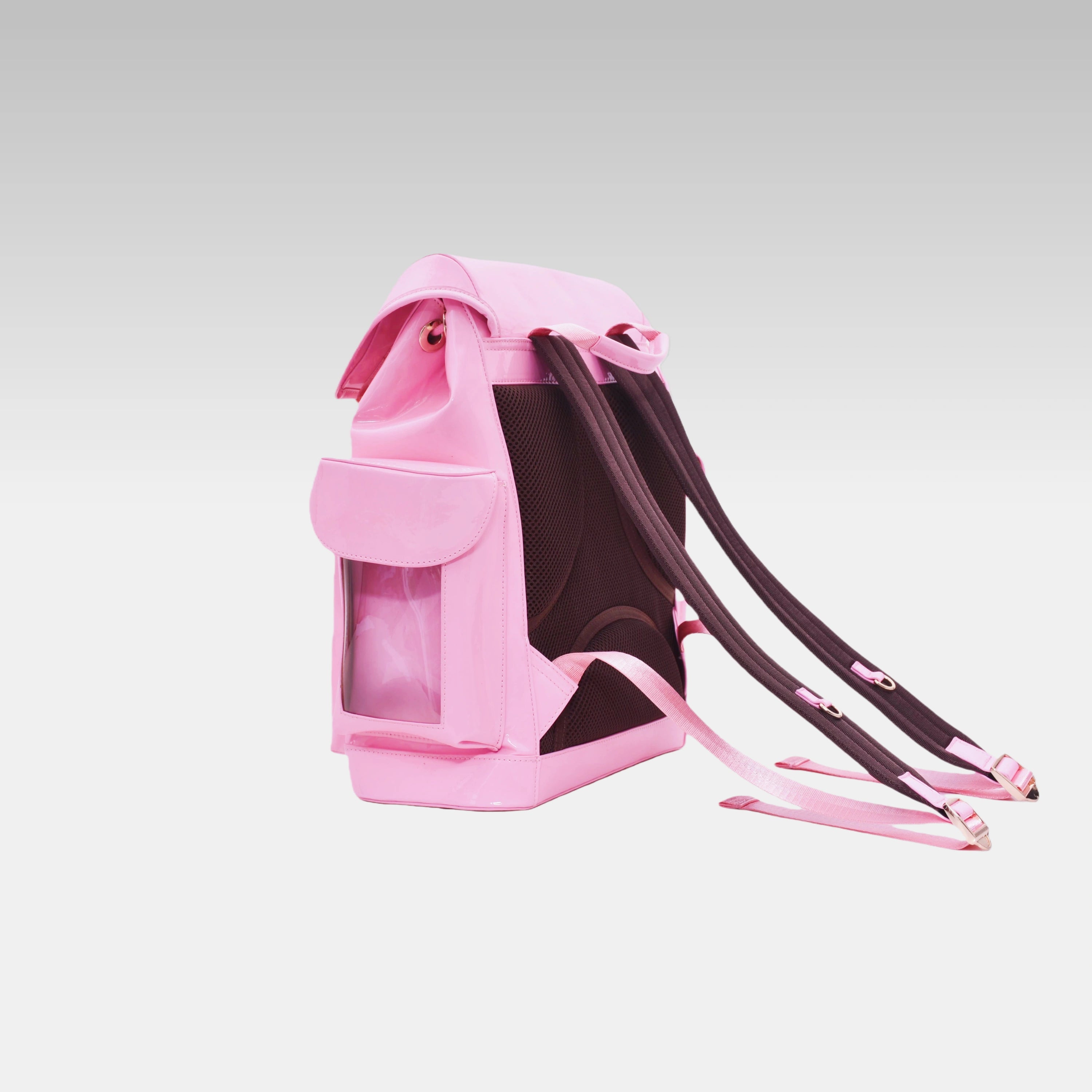 Clean side profile of the Pastel Pink Cyberpunk Ita Backpack showing its structured depth and zippers.