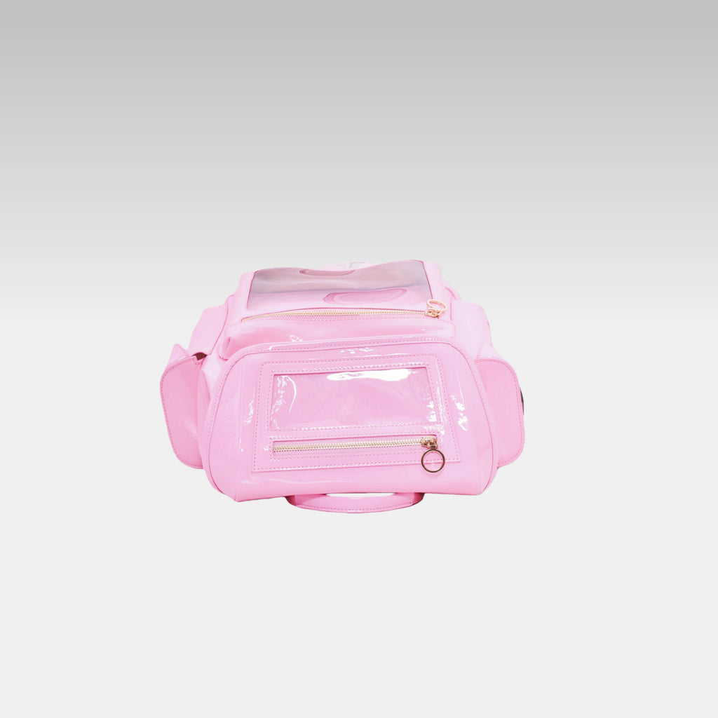 Top-down view of the Pastel Pink Cyberpunk Ita Backpack highlighting the main zipper closures and top grab handle.