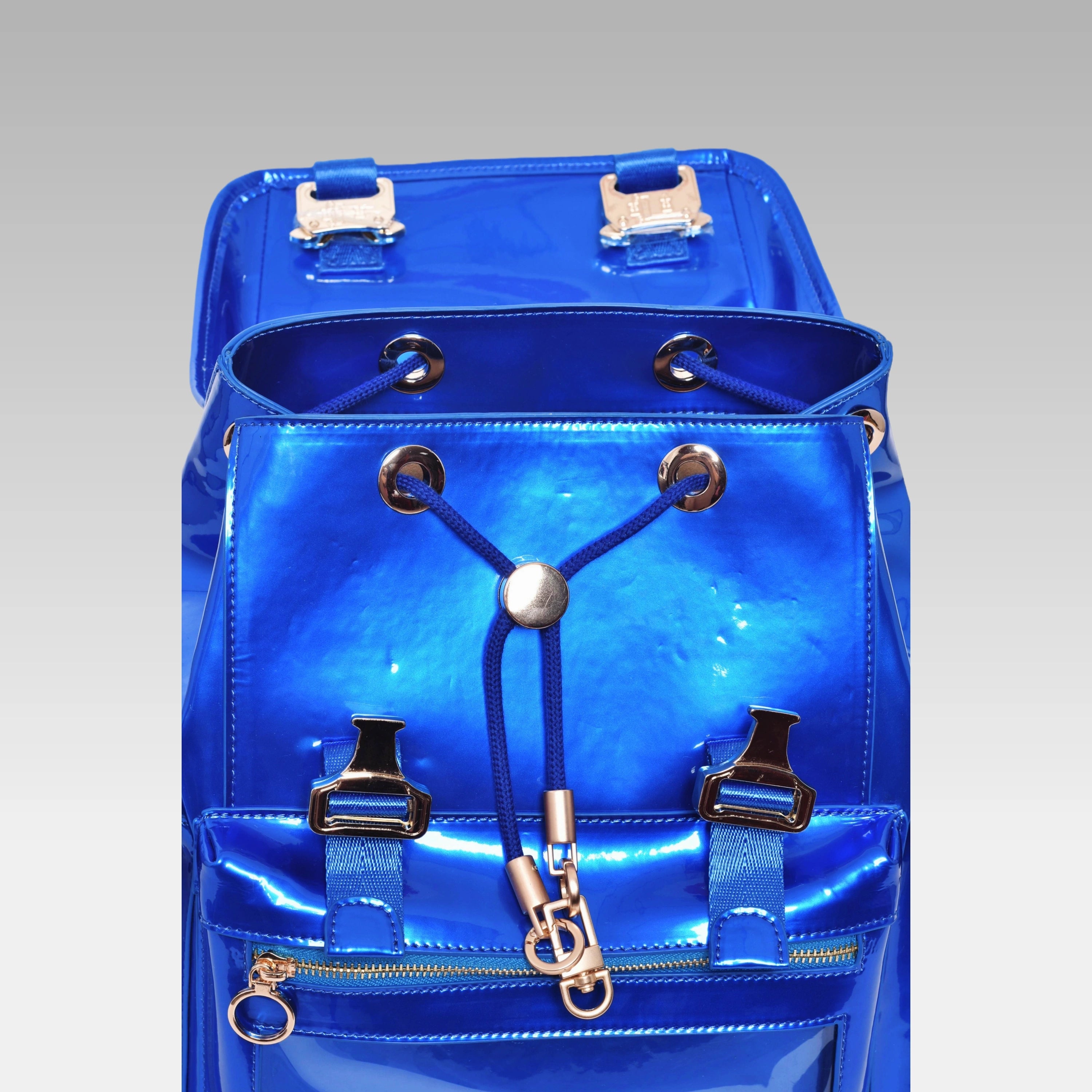 Metallic Quantum Blue Cyberpunk Ita Backpack with the front display cover opened, revealing the main chamber.