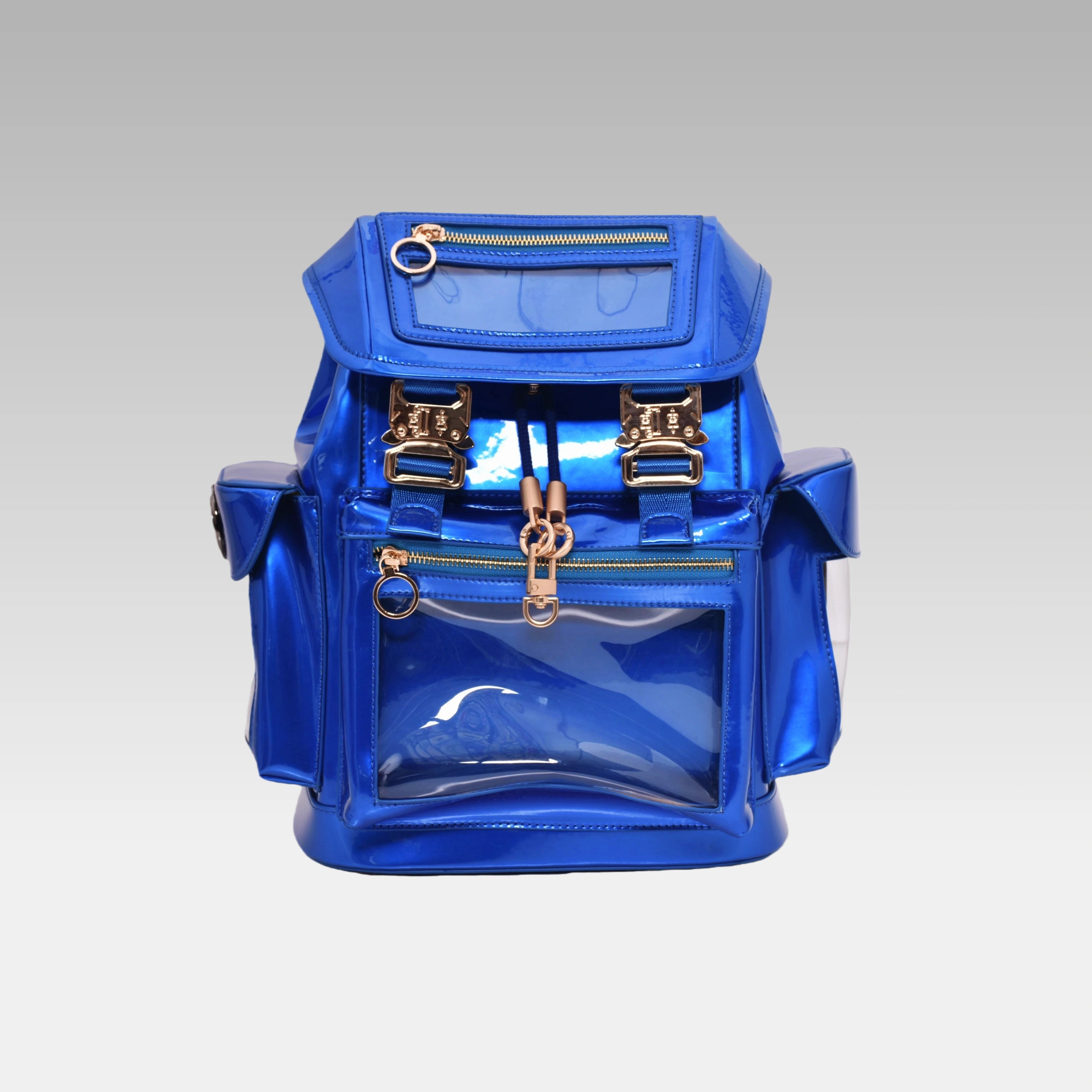 Front view of the metallic Quantum Blue Cyberpunk Ita Backpack Mini, featuring its clear display window.