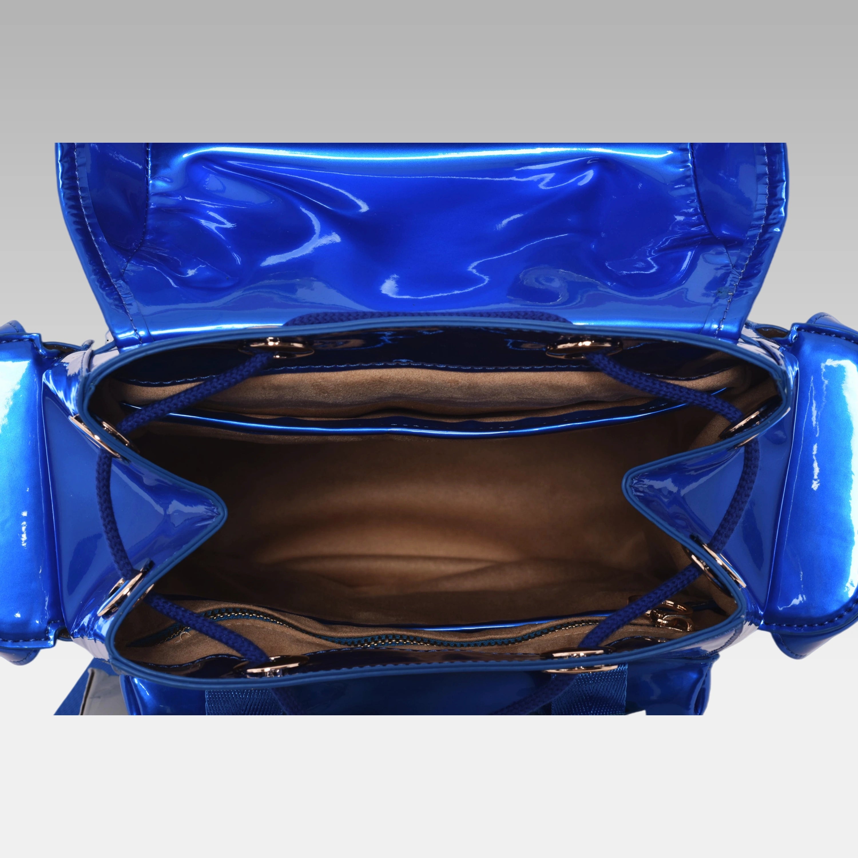 Interior view of the Quantum Blue Cyberpunk Ita Backpack Mini showing the custom fabric lining and storage compartments.