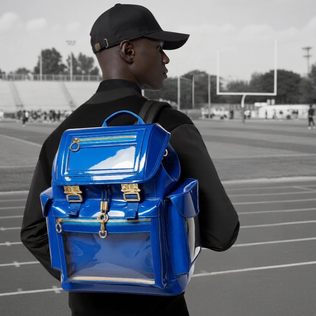 Model wearing the standard Quantum Blue Cyberpunk Ita Backpack, a high quality ita bag acting as a durable clear window backpack for serious collectors.
