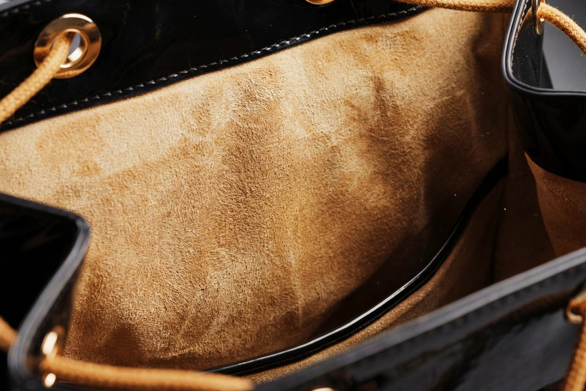 A close-up of the luxurious duplex flannelette interior lining inside the premium enamel pin bag, engineered to protect delicate tech and collectibles from scratches.